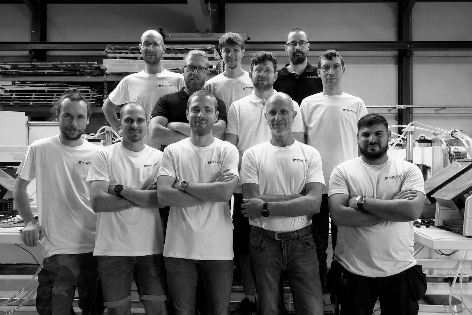 Photo de groupe de l'équipe Indutech, PME Verviétoise, constructeur de machines industrielles